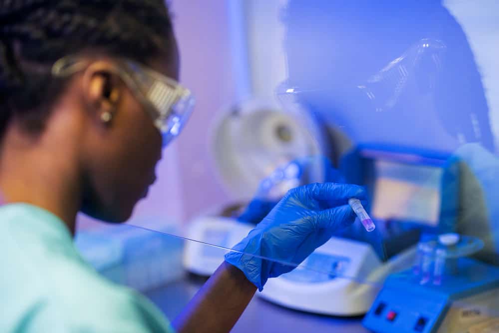 Doctor performing medical research in laboratory
